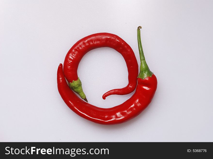 Red Chili Pepper On Bakgraund Wite.