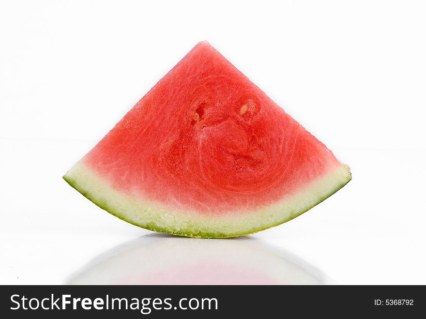 A slice of watermelon in an isolated background. A slice of watermelon in an isolated background