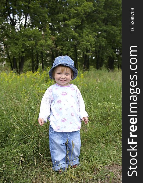 Girl On A Background Of A Landscape