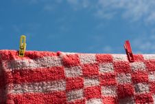 Laundry Pins Holding Red Fleecy Blanket Royalty Free Stock Photos Laundry Pins Holding Red Fleecy Blanket Royalty Free Stock Photos