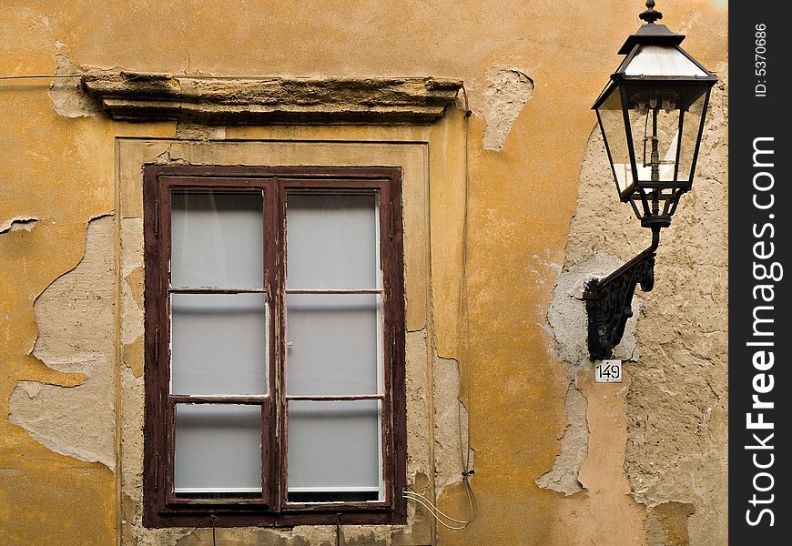 One of Zagreb old town windows with gas-lamp near it. One of Zagreb old town windows with gas-lamp near it.