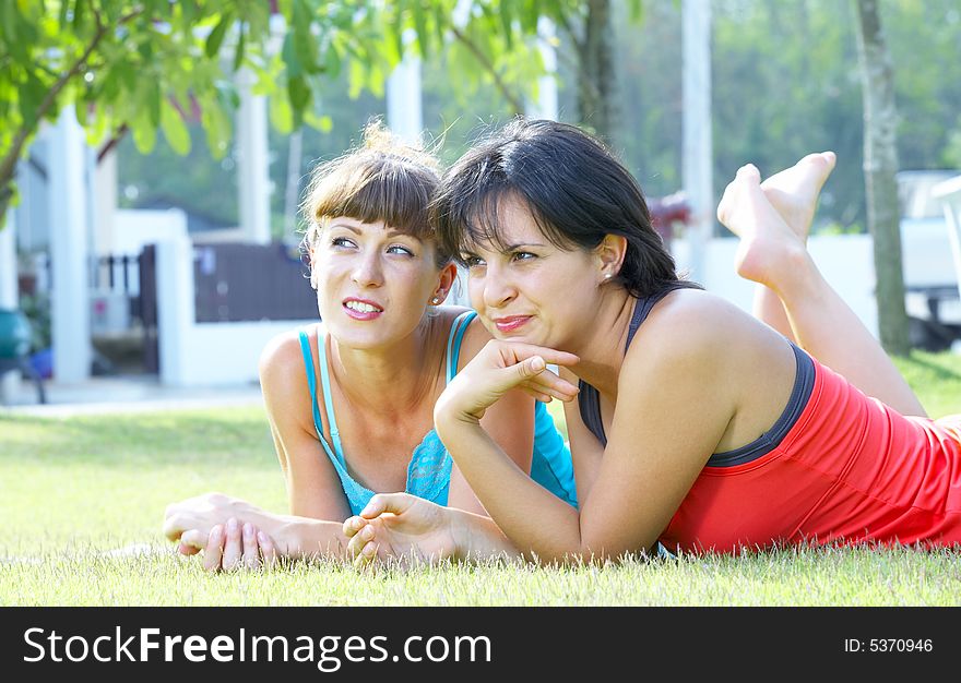 Portrait of two young woman  having fun in summer environment. Portrait of two young woman  having fun in summer environment
