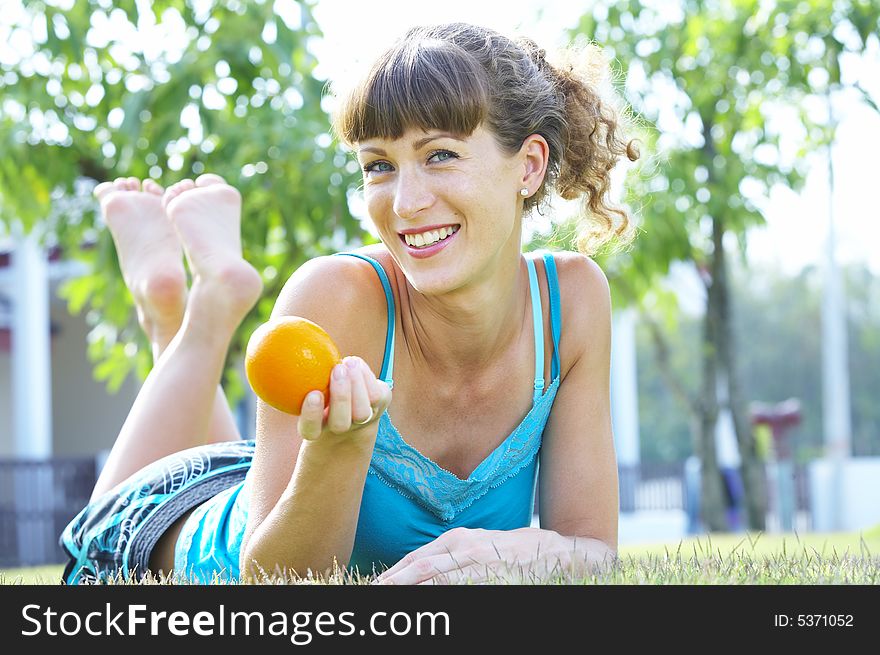Portrait of young beautiful woman in summer environment. Portrait of young beautiful woman in summer environment