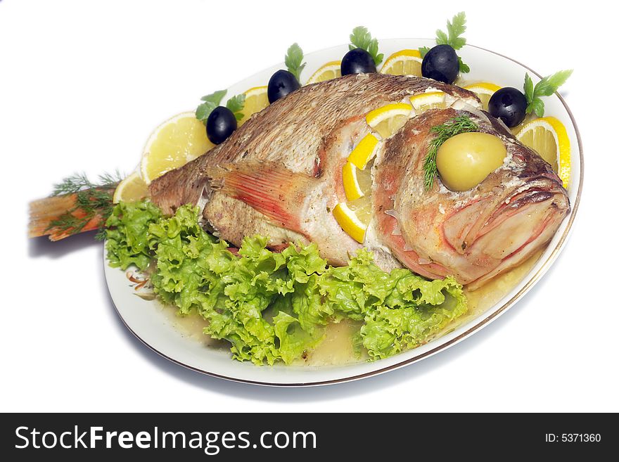 Baked perch fish with salad isolated. Baked perch fish with salad isolated