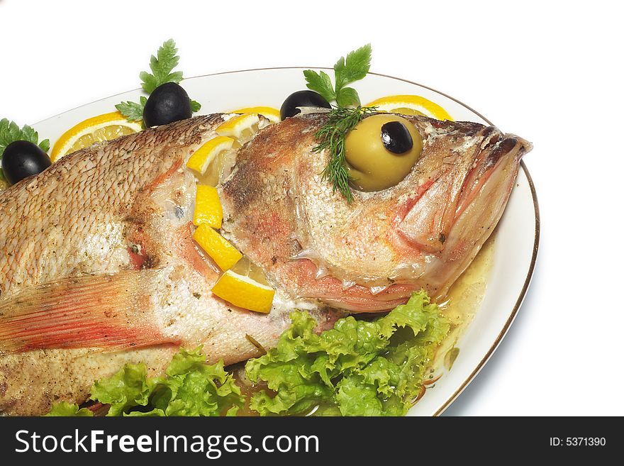 Baked perch fish with salad isolated. Baked perch fish with salad isolated