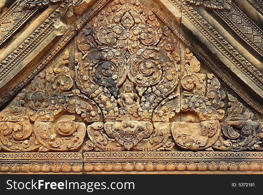 In Cambodia, in Angkor the 10th century temple of Banteay Srey was dedicated to the god Siva. The temple is known as ï¿½the jewel of the khmer artï¿½. Here an elaborated carved pediment. In Cambodia, in Angkor the 10th century temple of Banteay Srey was dedicated to the god Siva. The temple is known as ï¿½the jewel of the khmer artï¿½. Here an elaborated carved pediment