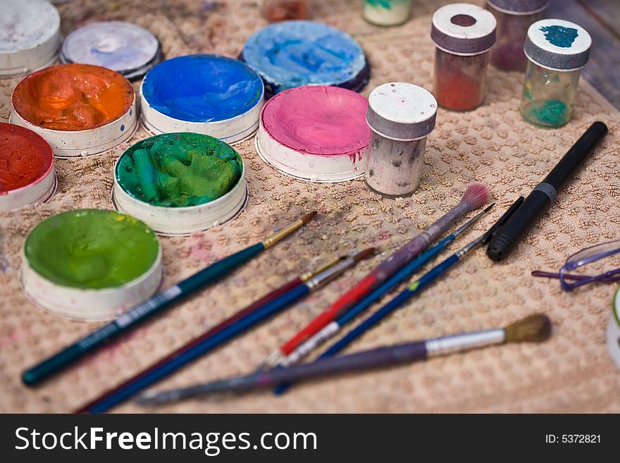 Various pigment paints and brushes