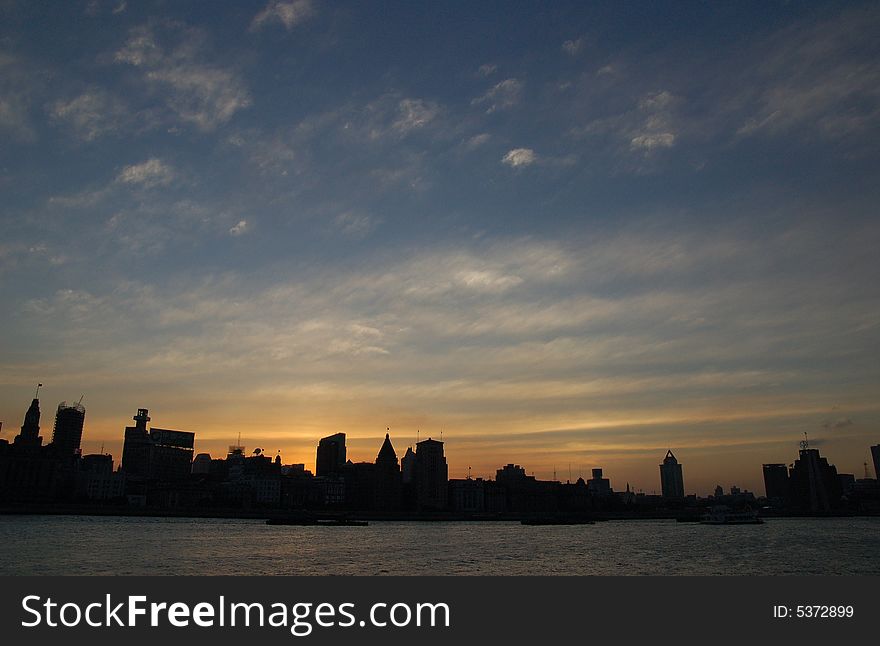 The sunset of the Bund beside the Huangpu River is one of the most beautiful scene in Shanghai city of China
