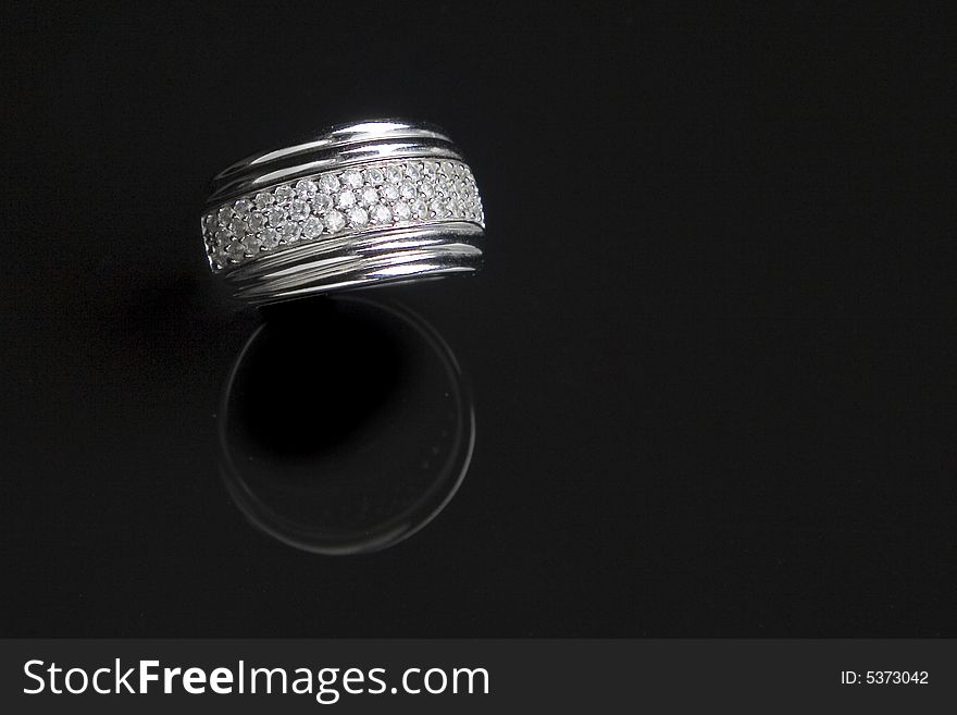 Diamond Ring With Reflection In Isolated Black Bac