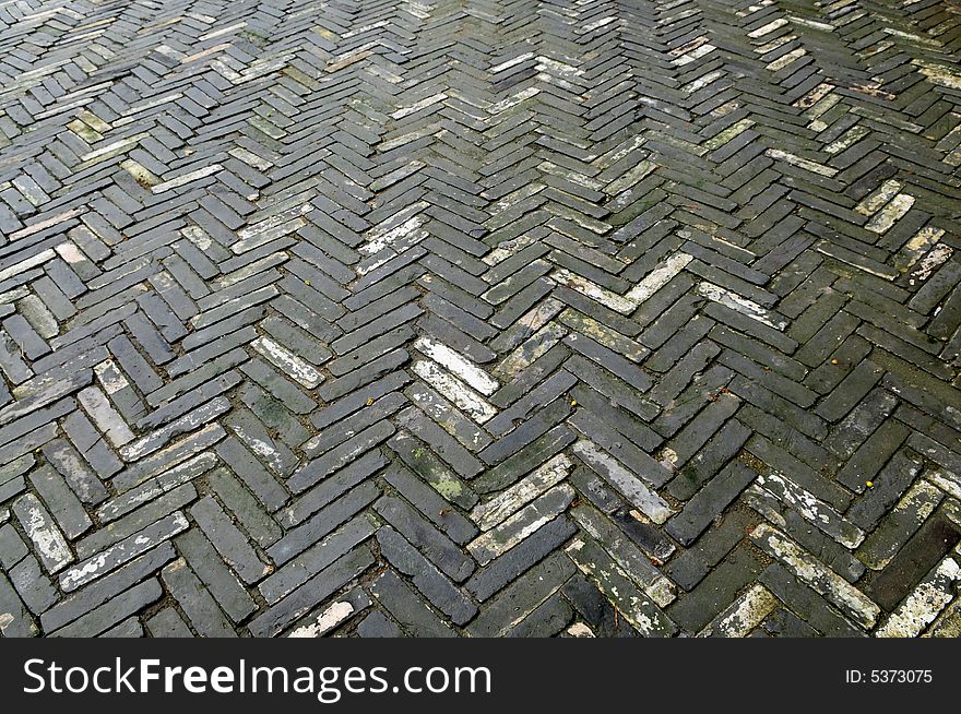 The ancient Chinese caesious bricked ground in a patio. The ancient Chinese caesious bricked ground in a patio.