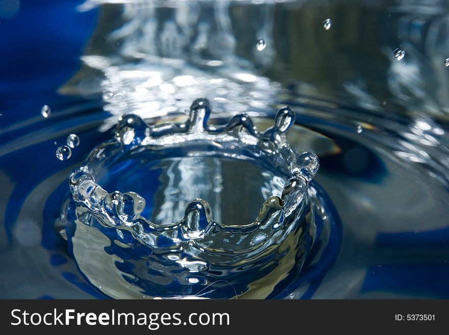 Fantastical water background. Drops, waves, splashes, figure, abstraction