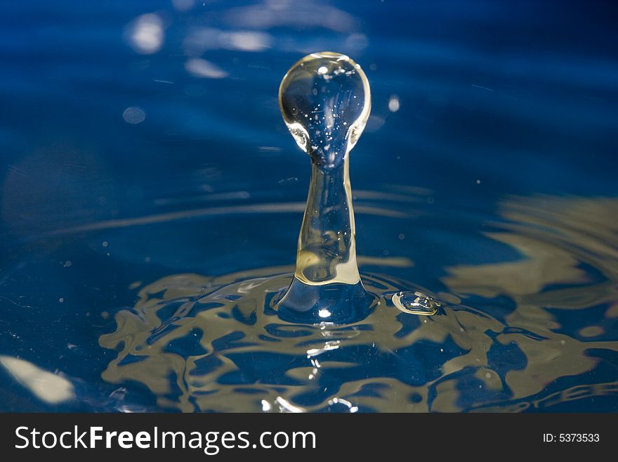 Fantastical water background. Drops, waves, splash