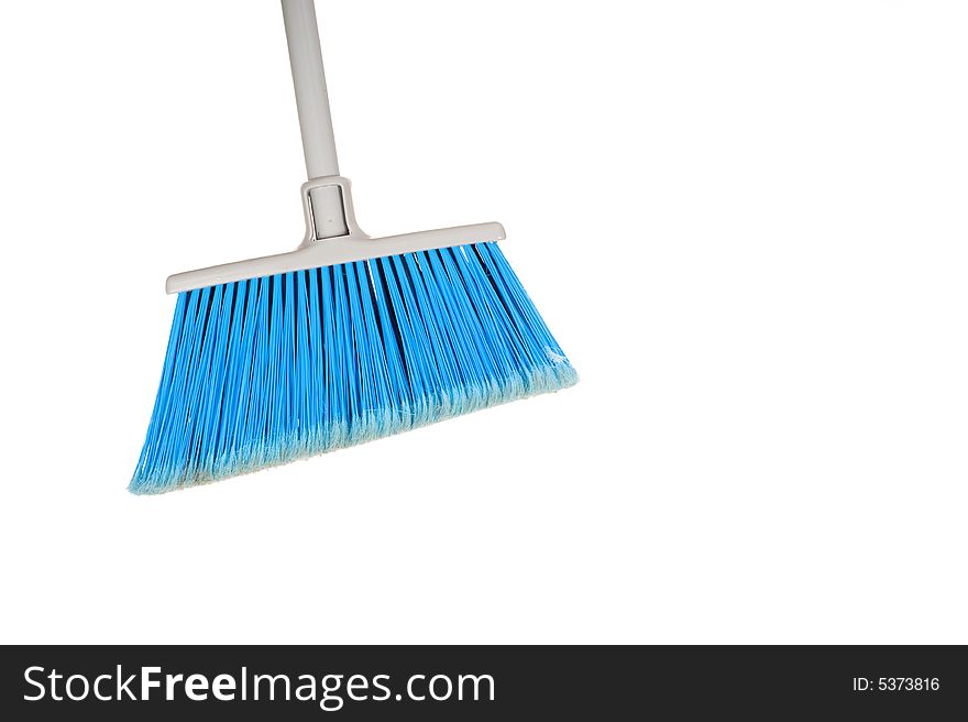 A blue broom on a white background with copy space