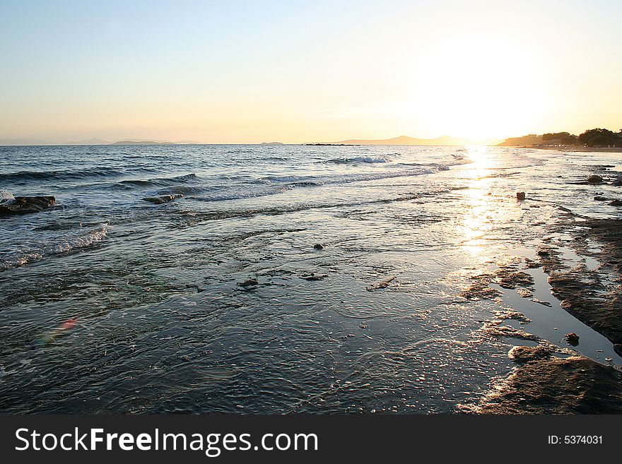 Greek Coast over a beautiful sunset