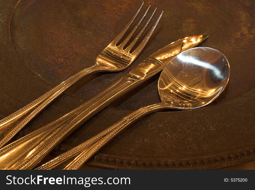 Cutlery on a copper plate at a function venue