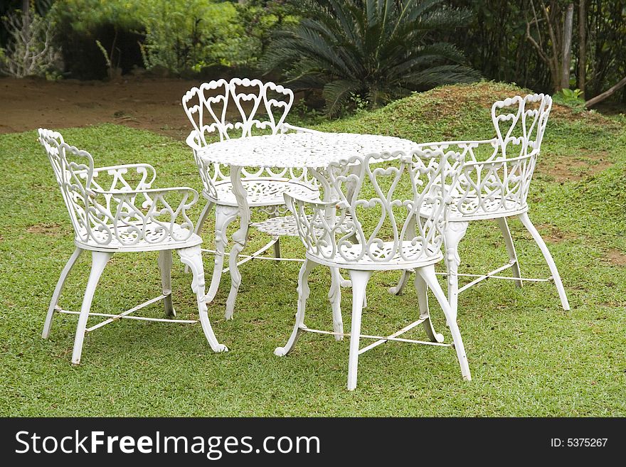 chairs on the grass in the open air cafe