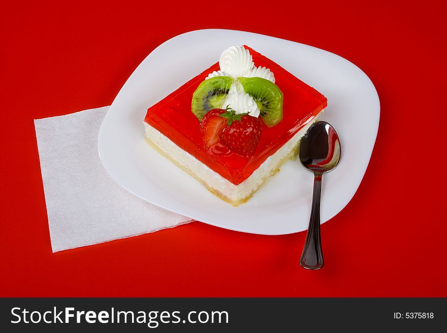 Red dessert, on white plate