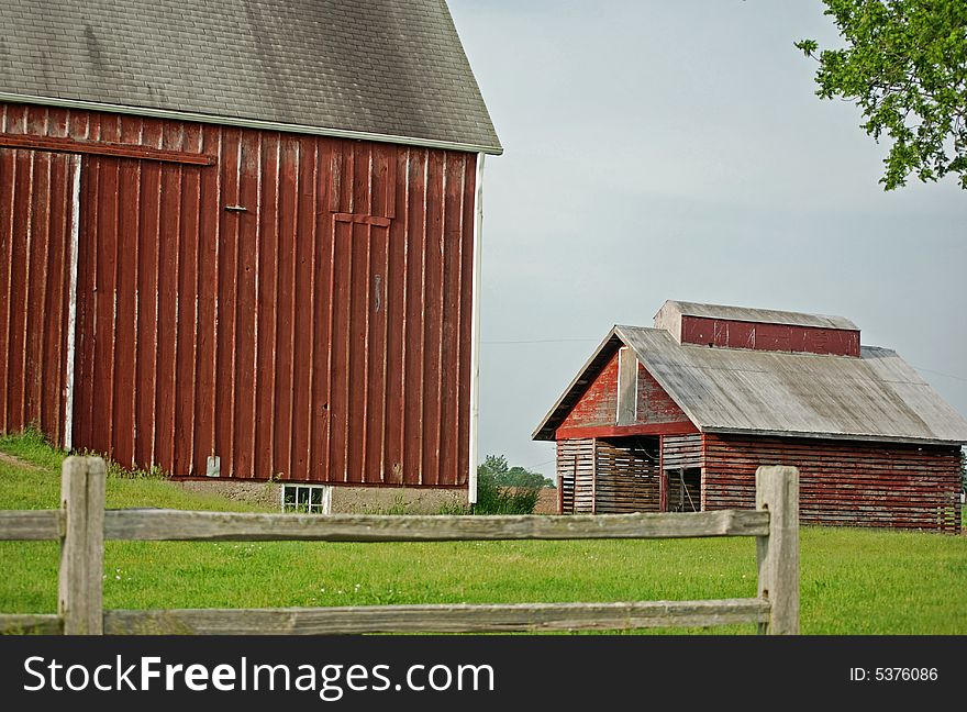 Old corn crib and barn on a farm. Old corn crib and barn on a farm.