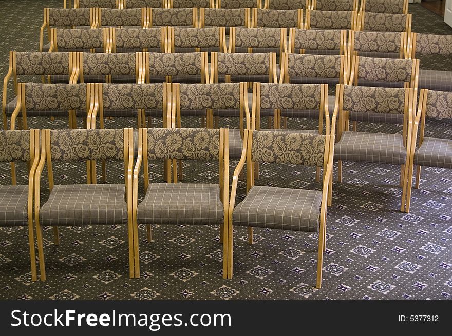 Chairs lined up in auditorium