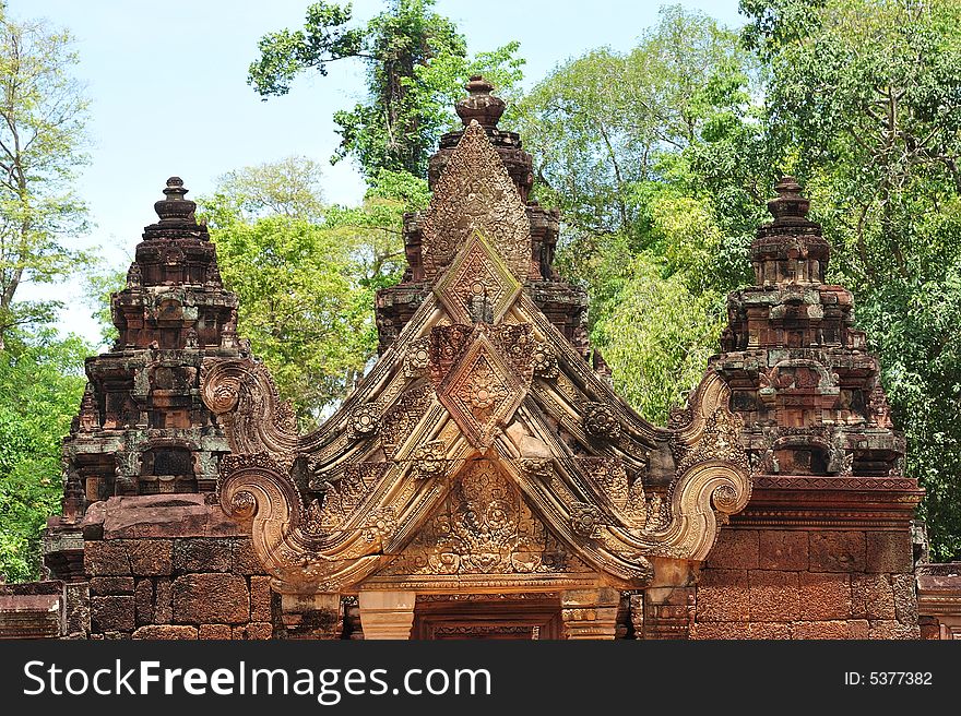 In Cambodia, in Angkor the 10th century temple of Banteay Srey was dedicated to the god Siva. The temple is known as �the jewel of the khmer art�. Here one of the carved gopuras. In Cambodia, in Angkor the 10th century temple of Banteay Srey was dedicated to the god Siva. The temple is known as �the jewel of the khmer art�. Here one of the carved gopuras