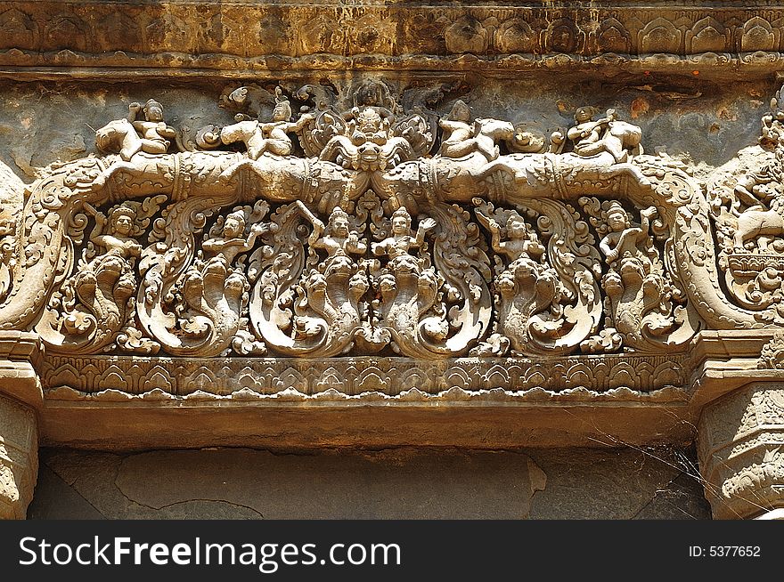 In Cambodia in the ancient city of Roulos the Hindu temple of Preah Ko orï¿½ The sacred bullï¿½ was built in the 9th century by the king Indravarman. View of a carved lintel. In Cambodia in the ancient city of Roulos the Hindu temple of Preah Ko orï¿½ The sacred bullï¿½ was built in the 9th century by the king Indravarman. View of a carved lintel