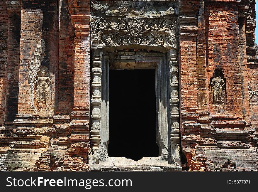 In Cambodia in the ancient city of Roulos the Hindu temple of Bakong was built in the 9th century by the king Indravarman I. View of the entrance. In Cambodia in the ancient city of Roulos the Hindu temple of Bakong was built in the 9th century by the king Indravarman I. View of the entrance