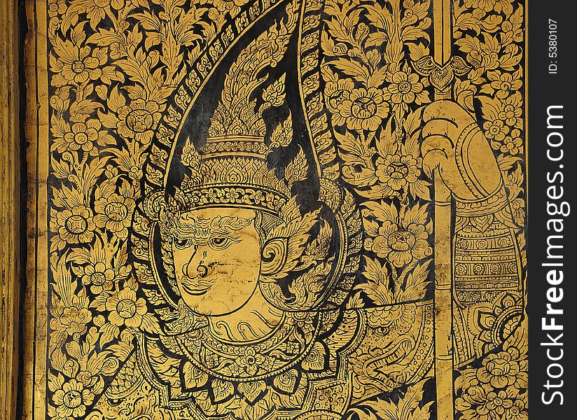 In Thailand, in Bangkok, the wat Suthat Thepwararam is a royal temple from the 19th century; the temple is remarkable for its ancient murals and its collection of Buddha images; detail of a painting door. In Thailand, in Bangkok, the wat Suthat Thepwararam is a royal temple from the 19th century; the temple is remarkable for its ancient murals and its collection of Buddha images; detail of a painting door