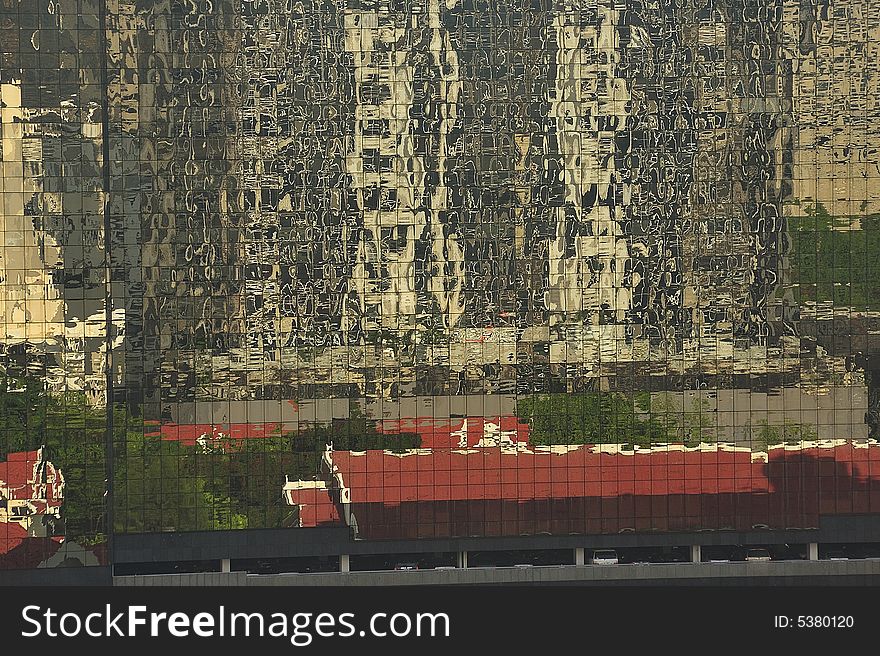 In Thailand, in Bangkok ; view of abstract reflects on the facade of a modern building with. In Thailand, in Bangkok ; view of abstract reflects on the facade of a modern building with