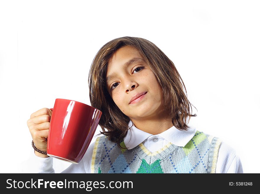 Young Trendy boy holding up a red mug. Young Trendy boy holding up a red mug