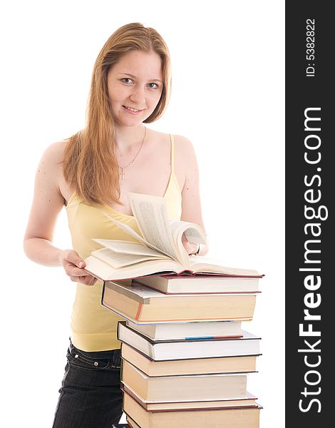 The young student with the books isolated on a white background