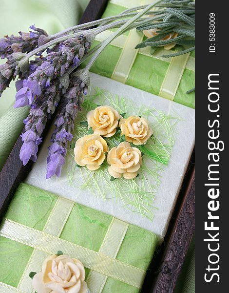 Soap Crate gift set wrapped in green, decorated with roses