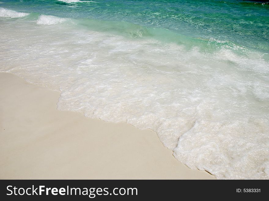 Waves on the shore of the Emerald Coast