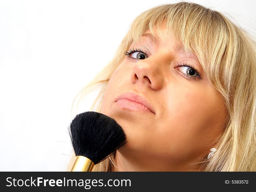 Beautiful women brushing face white background. Beautiful women brushing face white background.