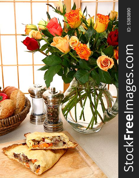 Meat pastry with beef, potatoes, carrots in kitchen or restauarant