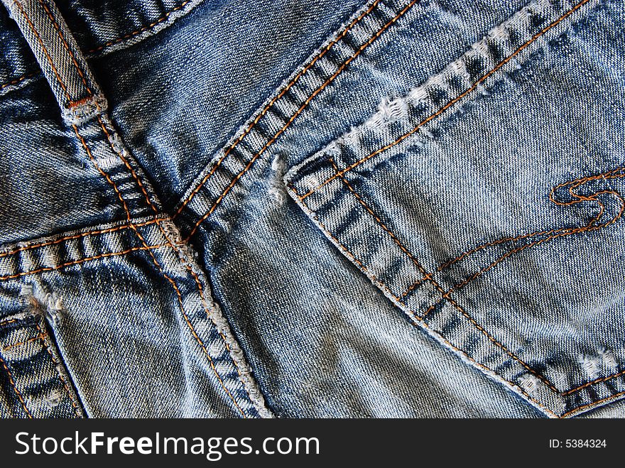 Close-up of worn, faded, jeans. Close-up of worn, faded, jeans
