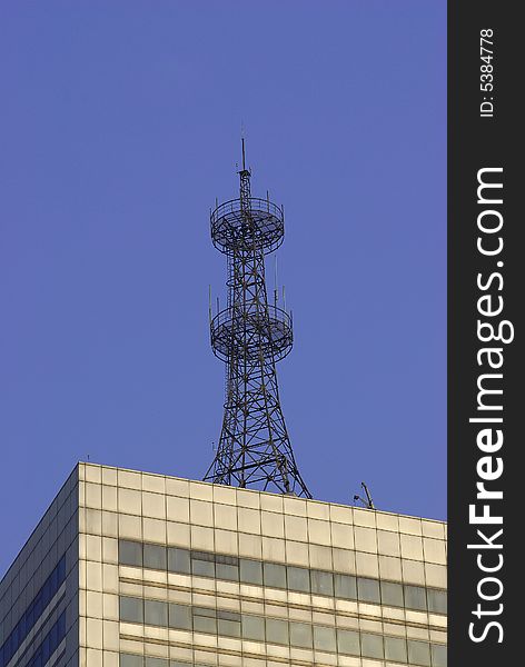 Communication tower with blue sky