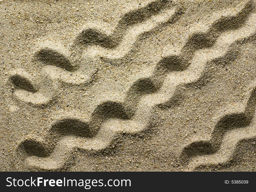 Simple pattern on sand surface. Simple pattern on sand surface