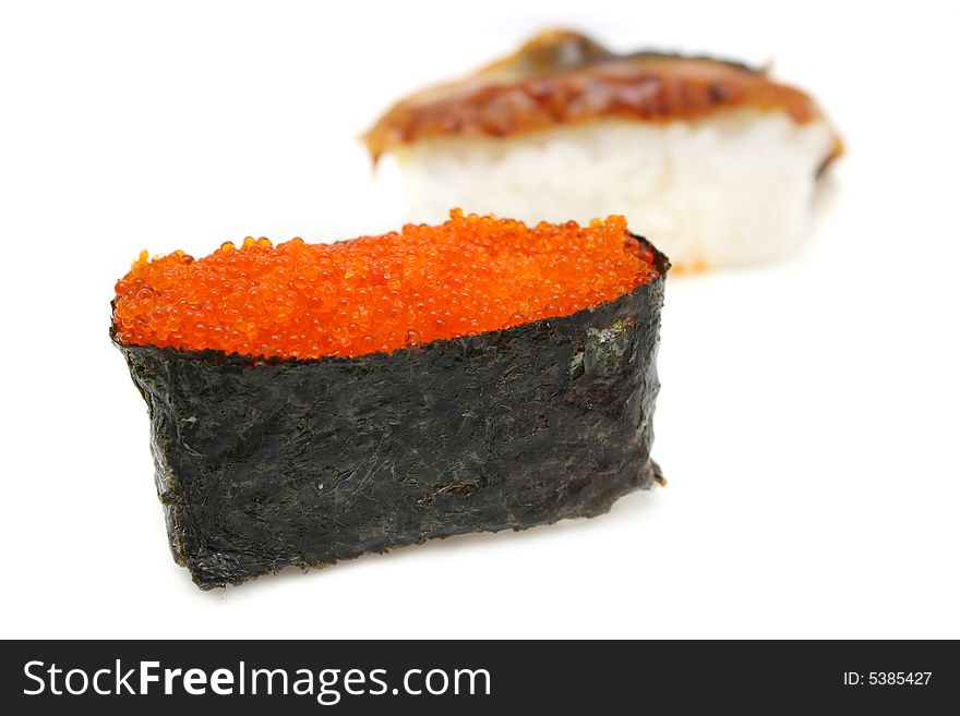 Close up of a salmon egg sushi over white background. Close up of a salmon egg sushi over white background.