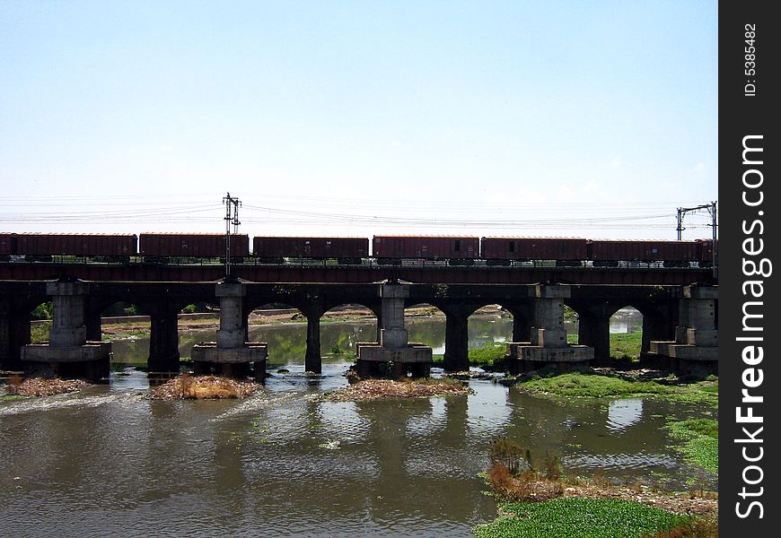 A transport train passing over the bridge. A transport train passing over the bridge