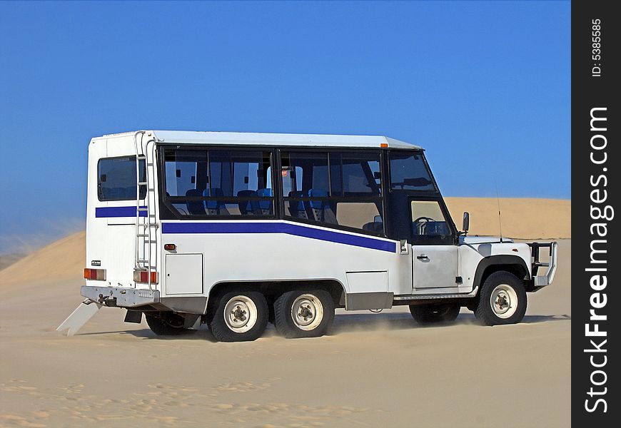 Traveling in the desert, wind in a sand dunes