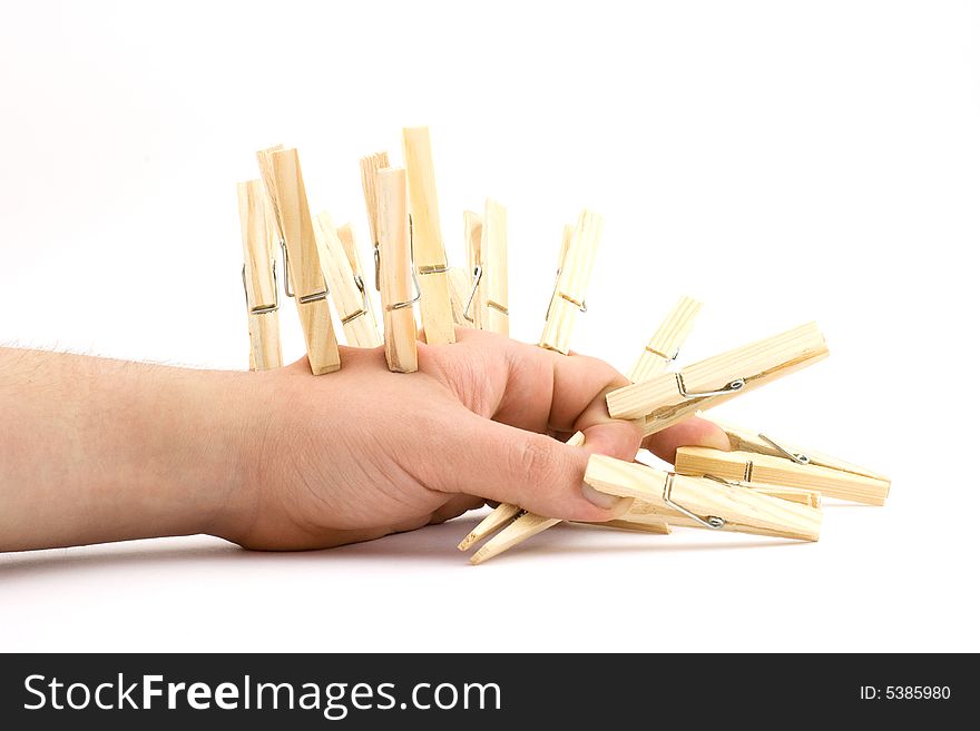 Isolated photo of human hand and pegs. Isolated photo of human hand and pegs