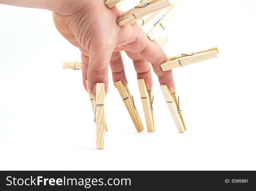 Isolated photo of human hand and pegs. Isolated photo of human hand and pegs
