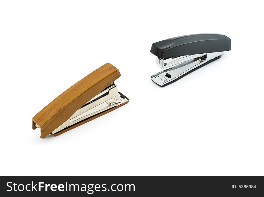 Isolated photo of black and brown staplers