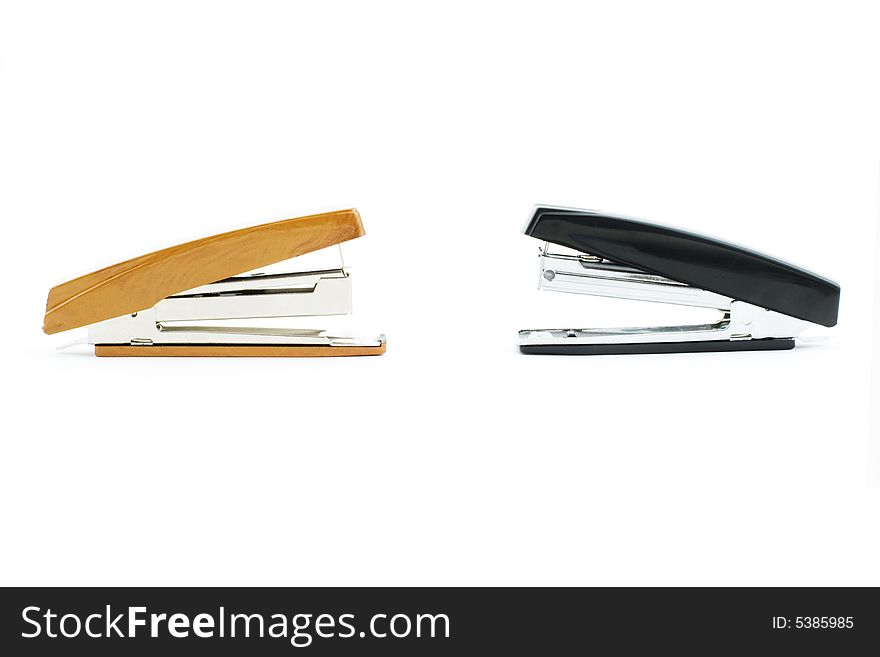 Isolated photo of black and brown staplers