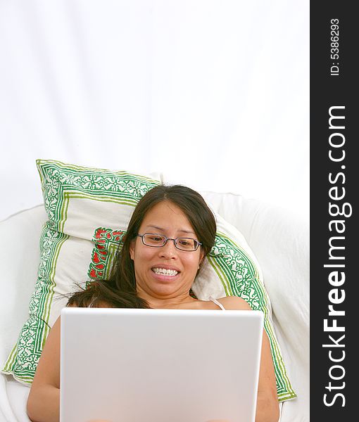 Excited Asian Woman And Laptop