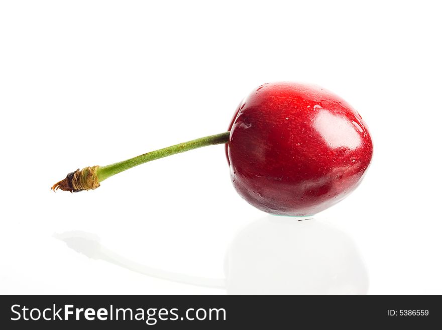 An image of red cherry isolated on white. An image of red cherry isolated on white