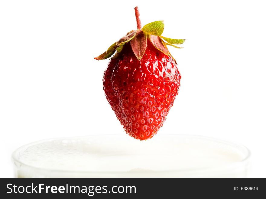 Red berry and glass with milk. Red berry and glass with milk