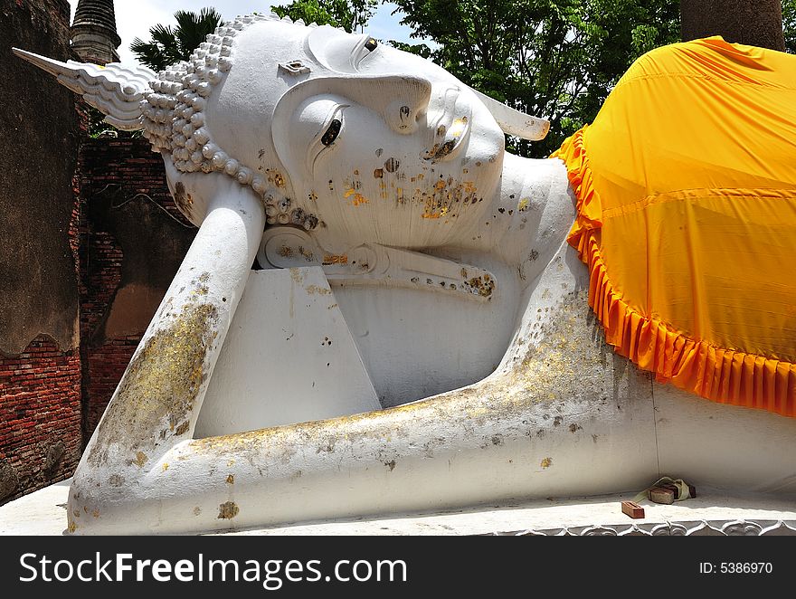 In Thailand the city of Ayutthaya was founded in 1350 today is an impressive archaeological park; here a view of the reclining Buddha at Wat Yai Chai Mongkhon. In Thailand the city of Ayutthaya was founded in 1350 today is an impressive archaeological park; here a view of the reclining Buddha at Wat Yai Chai Mongkhon