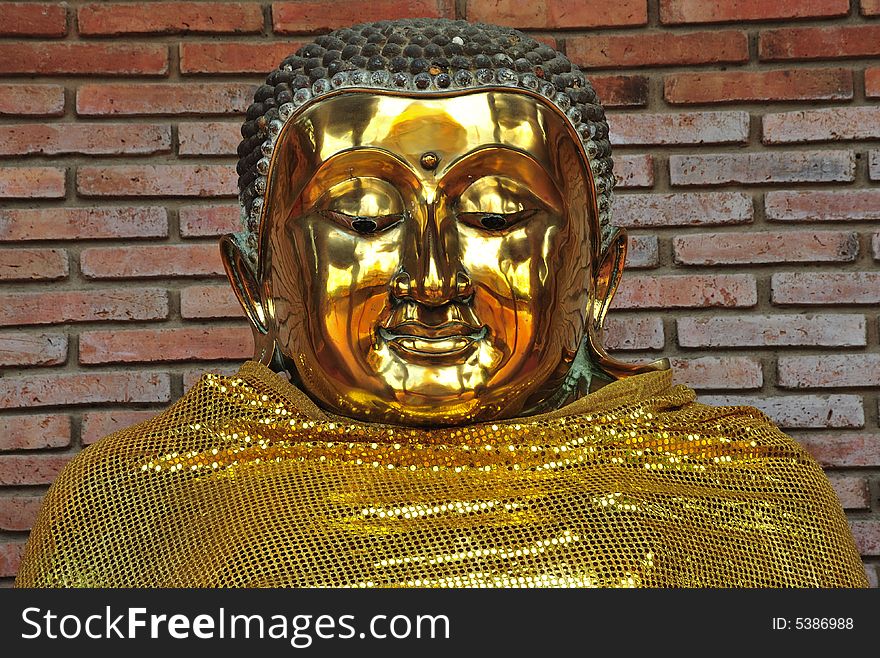 In Thailand the city of Ayutthaya was founded in 1350 today is an impressive archaeological park; here a view of a Buddha at Wat Yai Chai Mongkhon. In Thailand the city of Ayutthaya was founded in 1350 today is an impressive archaeological park; here a view of a Buddha at Wat Yai Chai Mongkhon