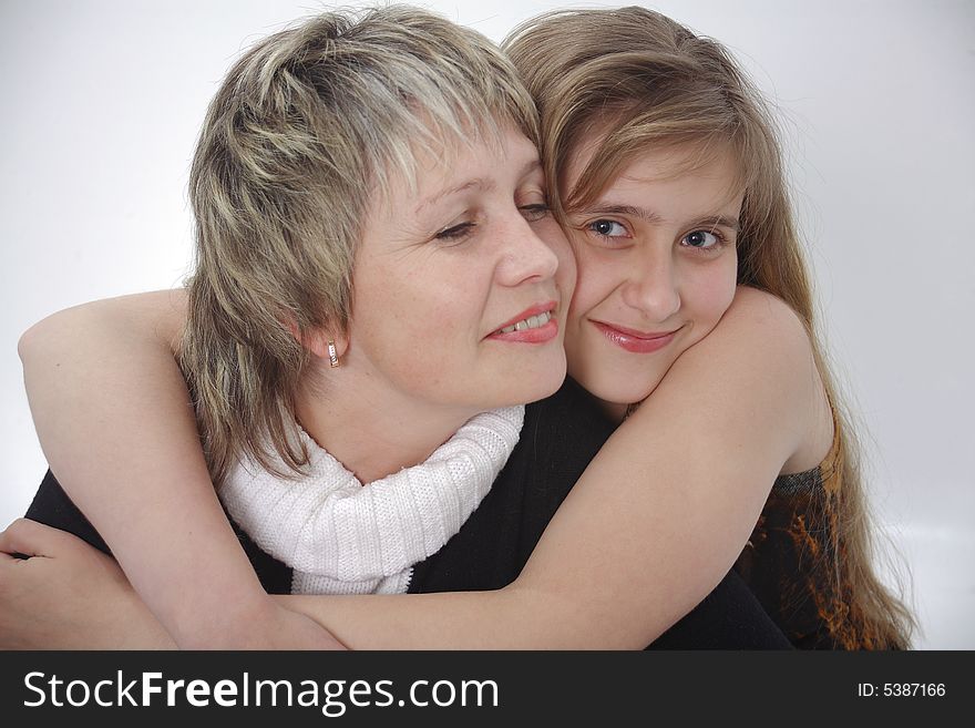 Mum and the daughter embrace. Mum and the daughter embrace